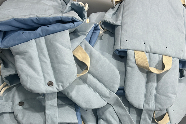 Create ideal puffy backpacks for brand with our profession and quality